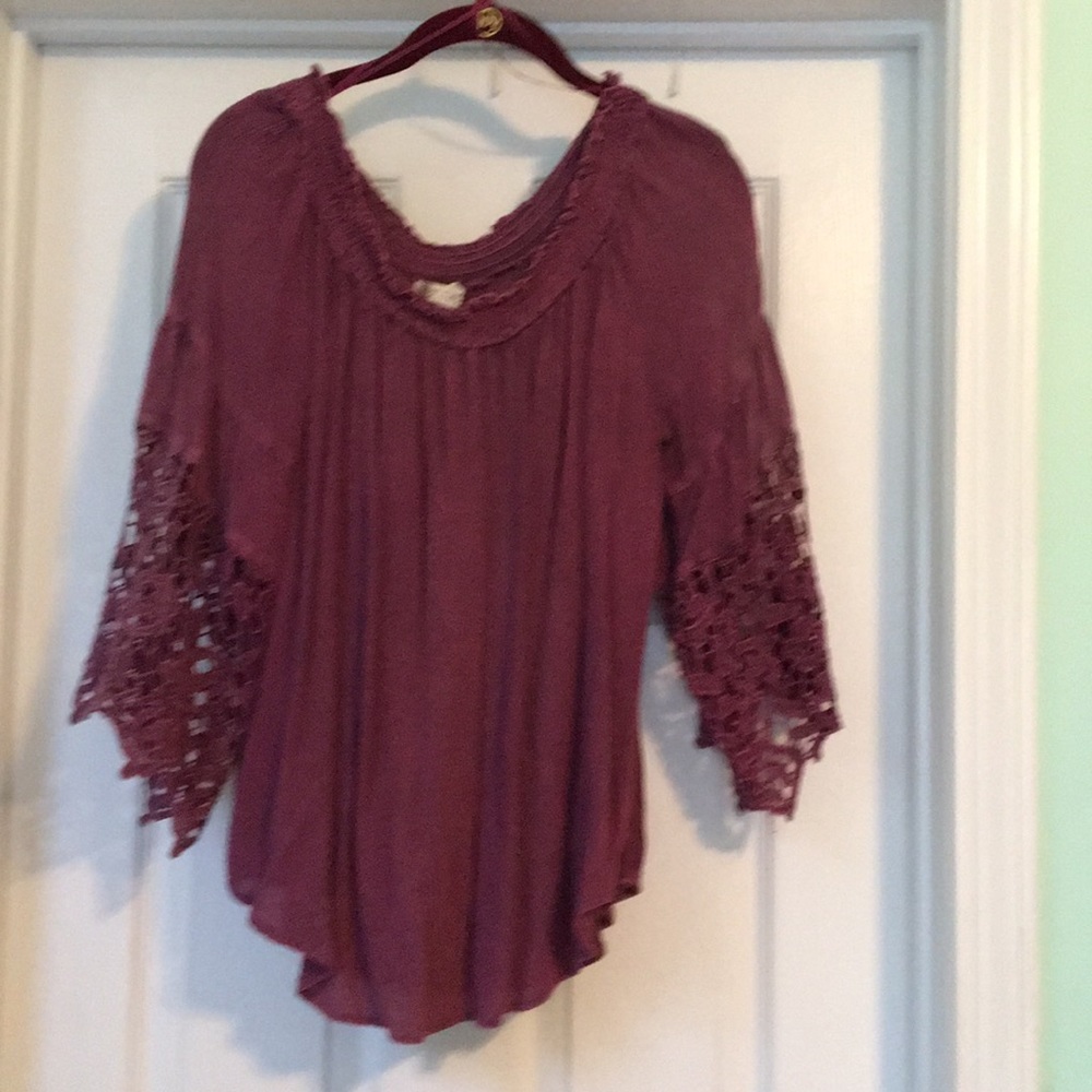 Deep purple. Hangs beautifully on fit.